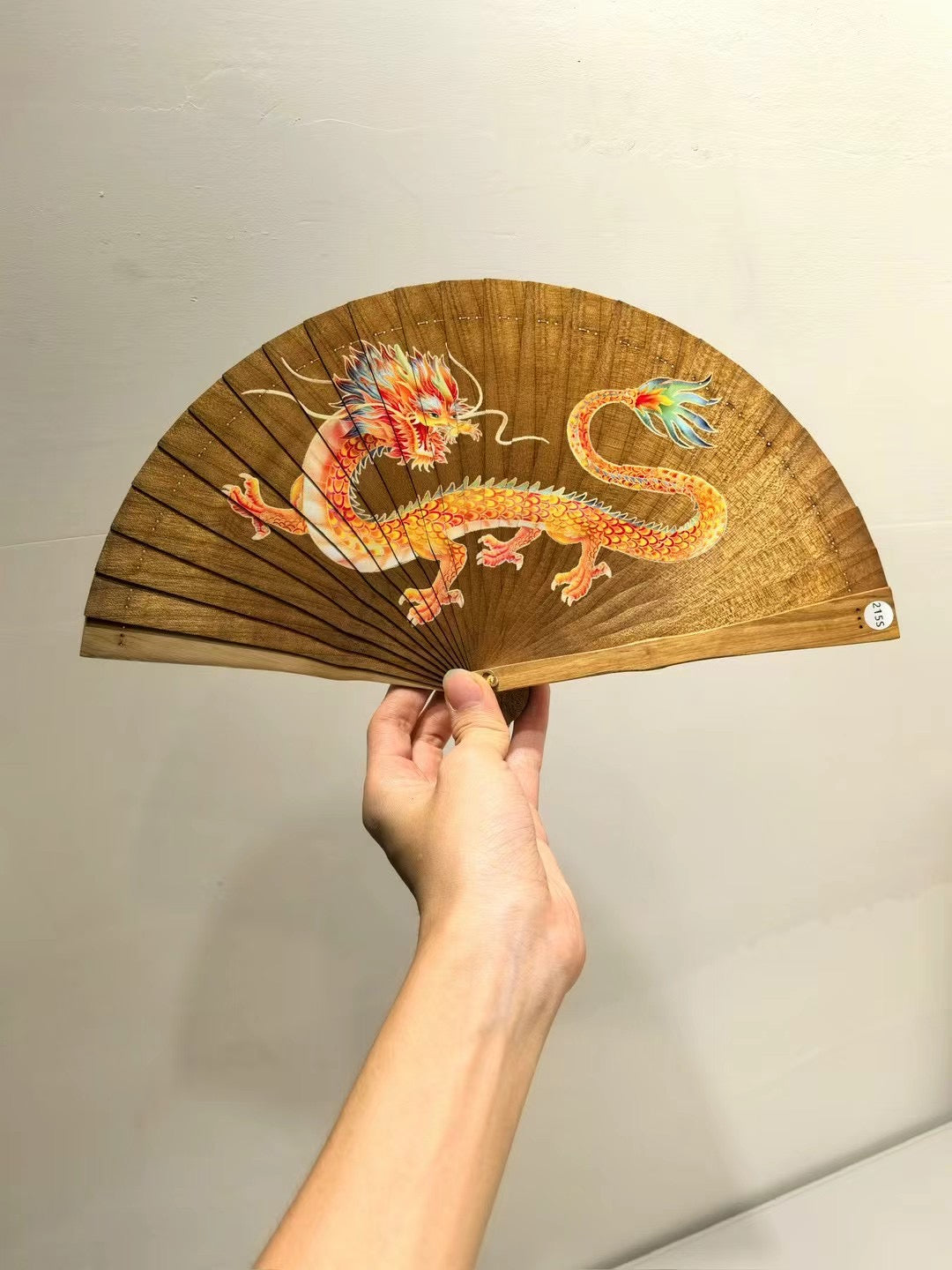Intricately Carved Golden Phoebe Wooden Fans